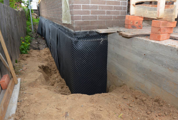 Happy homeowners after waterproofing job in Colton